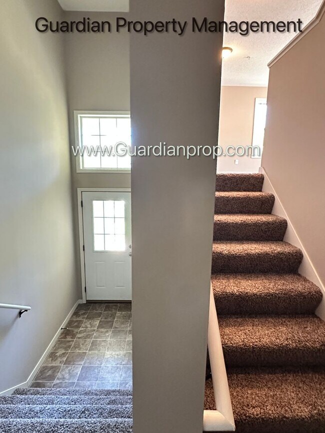 Building Photo - Champlin Corner Unit Town Home, 2 Car Garage, Dishwasher, Washer/Dryer, Balcony