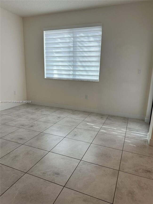 Building Photo - 4670 NW 84th Ave