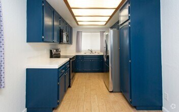 Building Photo - Renovated 3 bedroom 2 bath condo