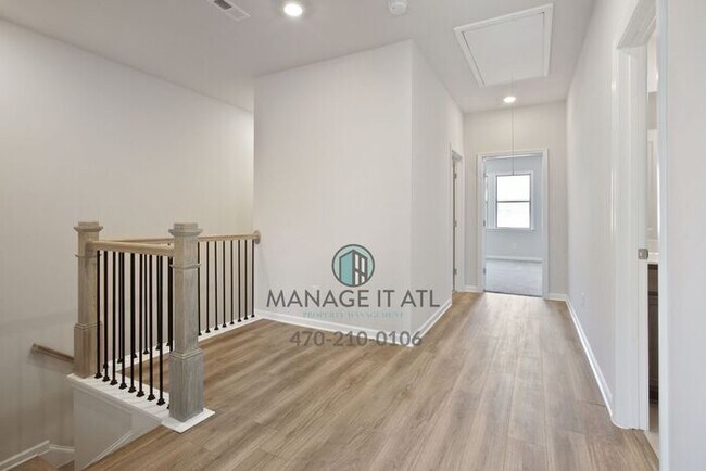 Building Photo - Modern 3-level Townhome featuring 4 bedrooms and 3 1/2 baths