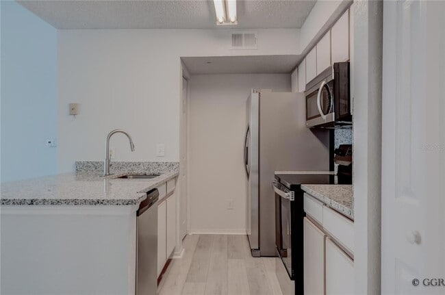 Building Photo - 2210 Grand Cayman Ct