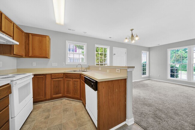Building Photo - Two-story Condominium with Easy Highway Ac...