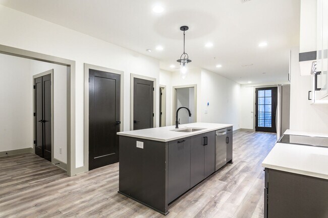 Building Photo - Modern Living Meets Walkable City Charm in...