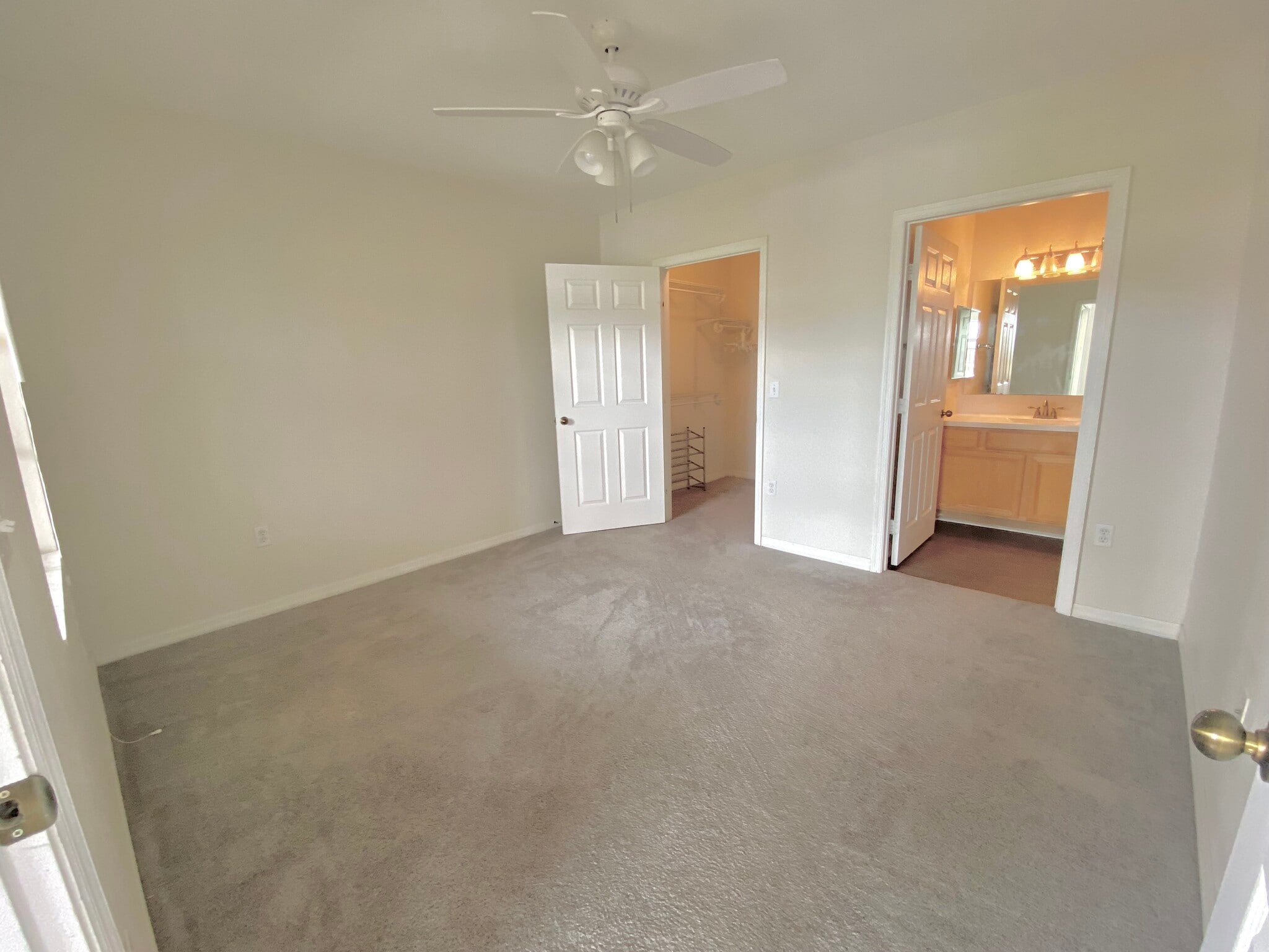 Master bedroom has lakefront view, enormous walk in closet, and en suite bathroom - 1025 Villagio Cir