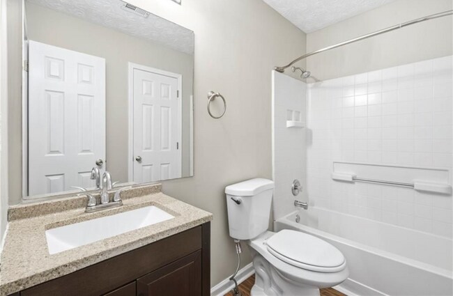 Building Photo - 2BR Townhome in Summerhill with Garage and Exterior Maintenance Included