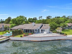 Building Photo - Fully Furnished 2 bedroom Lakefront with 1...