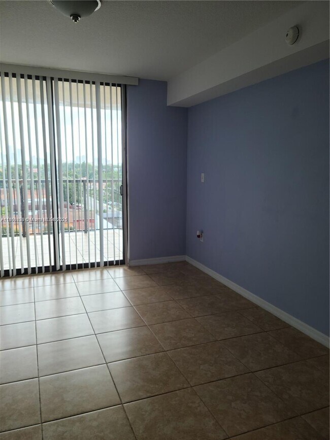 Building Photo - 1690 SW 27th Ave