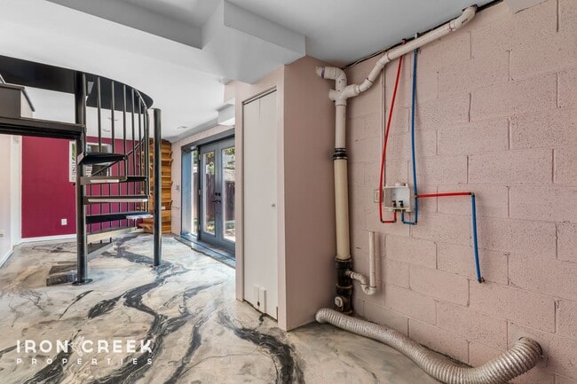 Building Photo - Beautifully Updated Three-Bedroom with Koi...