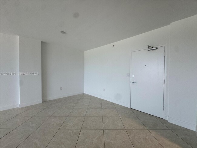 Building Photo - 10275 Collins Ave