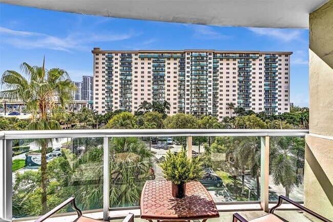 Building Photo - 19380 Collins Ave