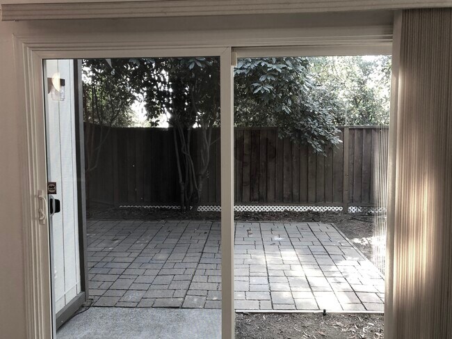 View of Enclosed Patio from Living Room - 2405 Deer Tree Ct