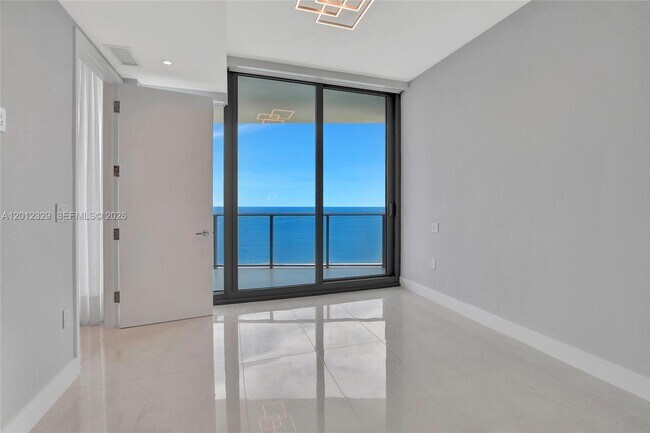 Building Photo - 15701 Collins Ave
