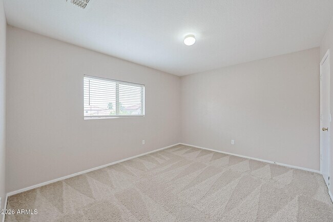 Building Photo - 15569 W Gelding Dr