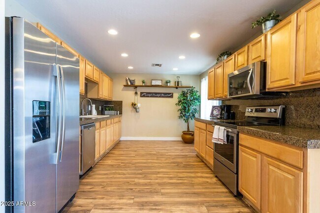 Building Photo - 8447 E Sheridan St