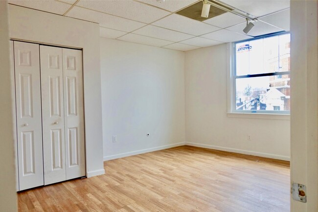 Bed room 2 with large closet and new double paned windows. - 5 E Broad St