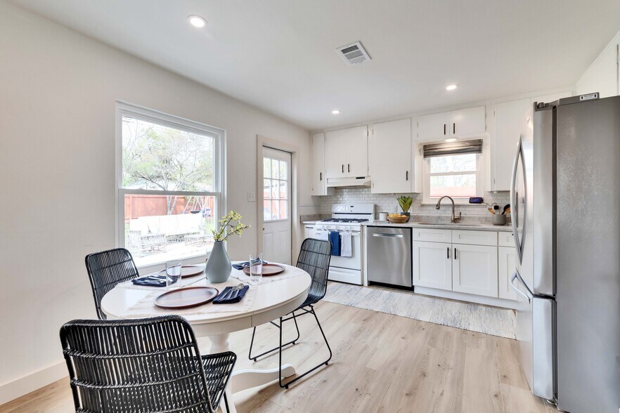 Dining area is nicely situated by a window in the kitchen, giving nice view to back yard - 2102 Bristol Dr