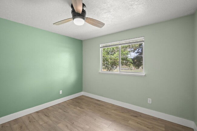 Building Photo - Charming 3-Bedroom Bend Home on 1/2 Acre with Expansive Yard, Mature Trees & Covered RV/Boat Storage