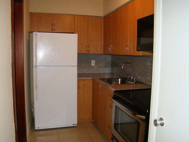 Building Photo - Move-In Special: One Month FREE + Competit...
