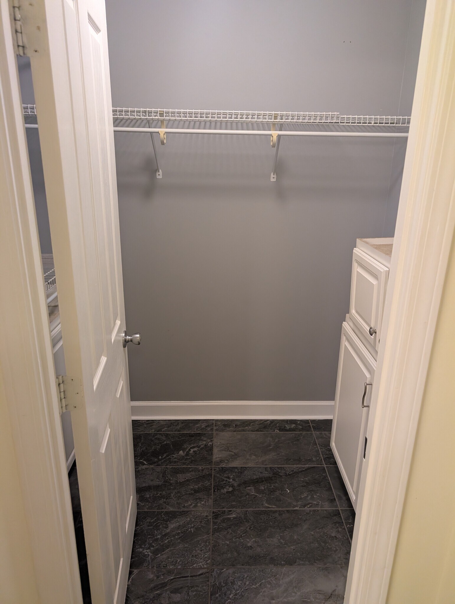 Walk-in closet with cabinets in bathroom - 1101 Juniper St NE