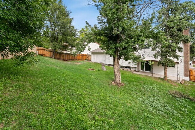 Building Photo - Freshly Renovated 4-Bedroom Home with Over...