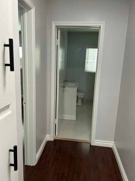 Hall to Bedroom and Bath - 325 S Doheny Dr