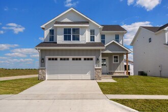 Building Photo - Spacious 4-Bedroom Home with 2-Car Garage & Yard