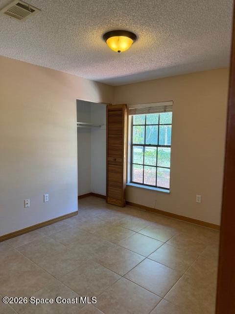 Building Photo - 1201 NE Tropicana Rd