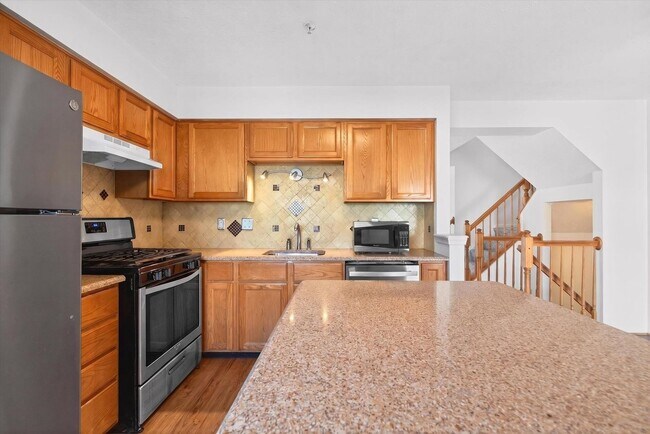 Building Photo - 3BR Townhome in Russett | 3 Levels | Walkout Basement + Deck | $2,400/mo** Beautiful 3-level town...