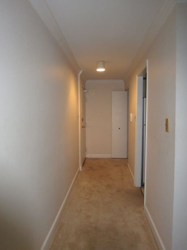 Building Photo - Conveniently located near Tysons, Metrobus, the Toll Road, and West Falls Metro.