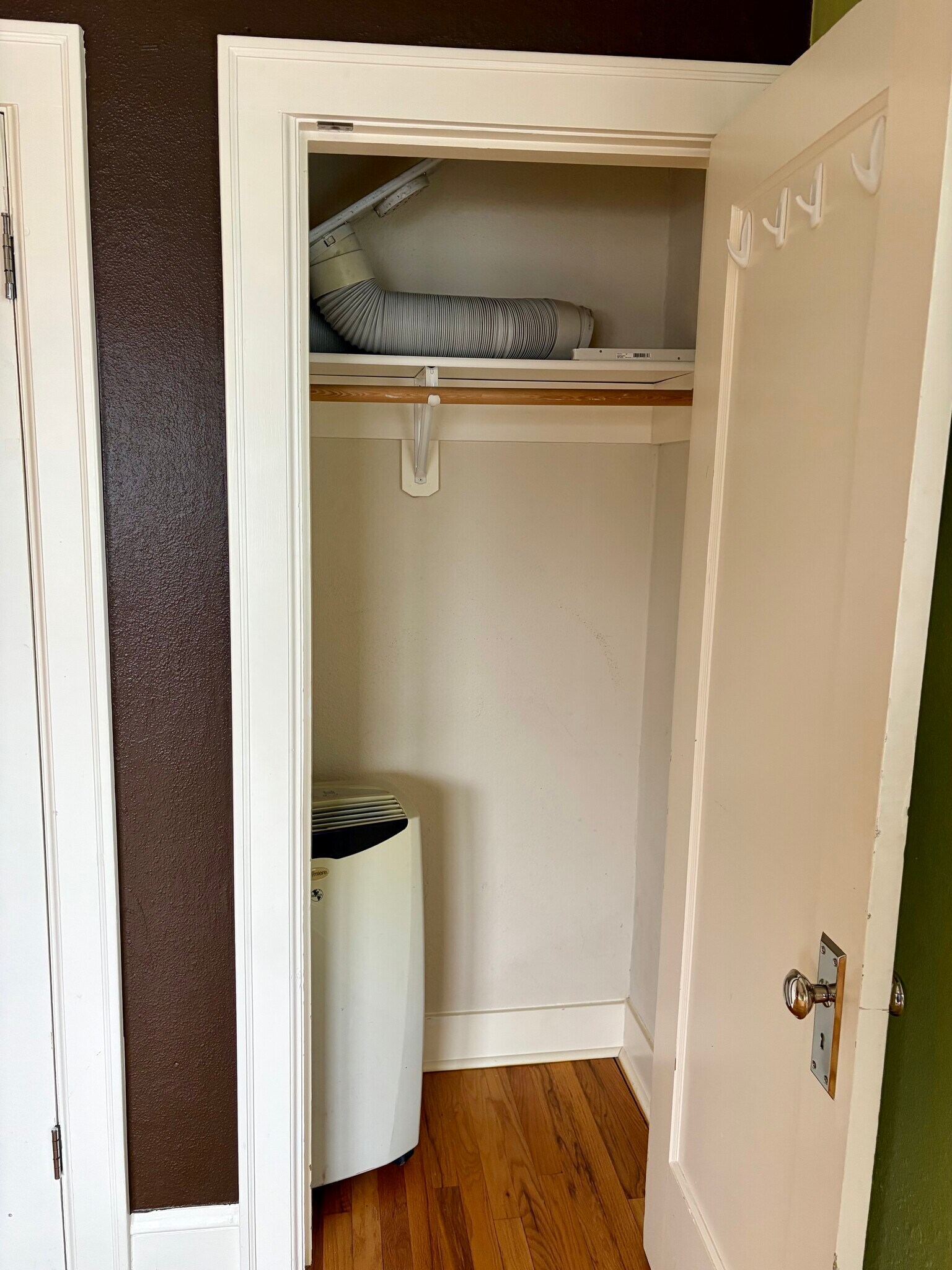 window 2/5 located in living room - portable air conditioner comes with apartment - 1509 NE 10th Ave