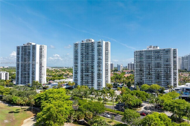 Building Photo - 3675 N Country Club Dr