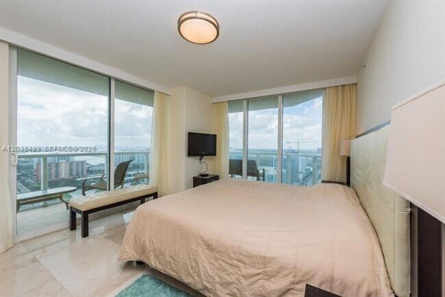 Building Photo - 16699 Collins Ave