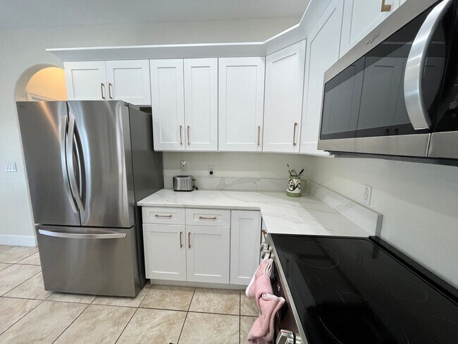 Building Photo - Beautiful Mediterranean Pool Home Availabl...