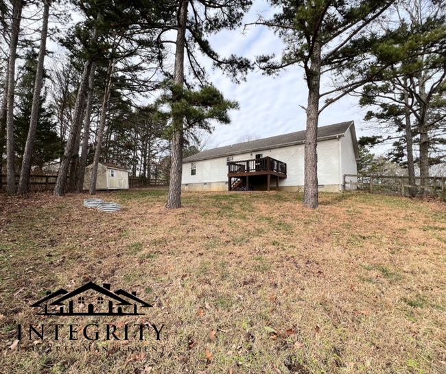 Building Photo - Home with a Fenced in Backyard Close to FLW