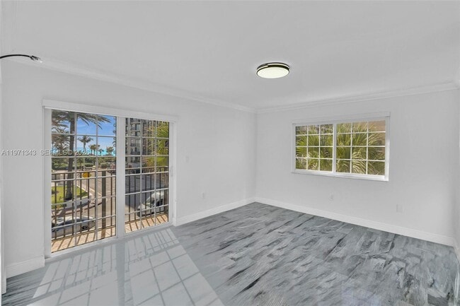 Building Photo - 8900 Collins Ave