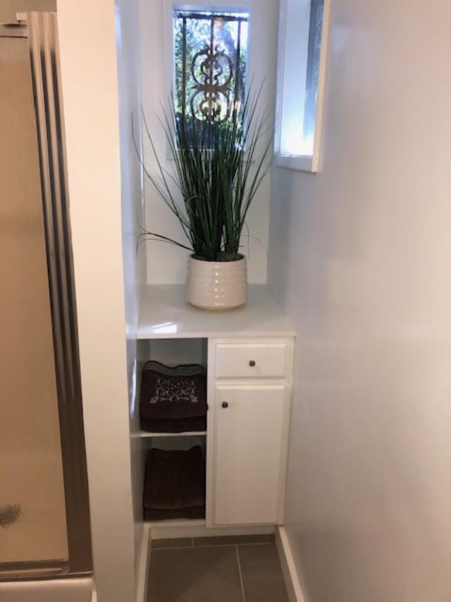 Extra storage in en-suite bathroom in Master - 1444 Silver Lake Blvd
