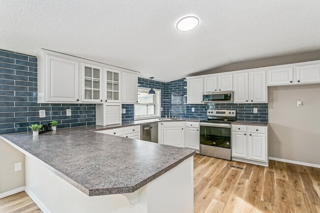 Building Photo - This move-in-ready home truly has it all comfort, function, and thoughtful upgrades throughout!