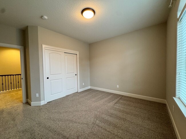 Building Photo - FOR RENT UNFURNISHED: Beautifully maintained 2015 Noyes-built home, 5 bed, 3 bath, 2 car garage w...