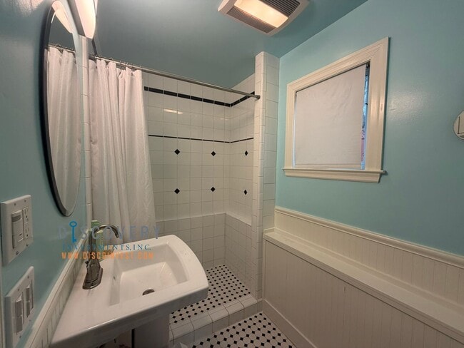 Building Photo - Lakeshore Craftsman with Detached Cottage and Versatile Bonus Rooms