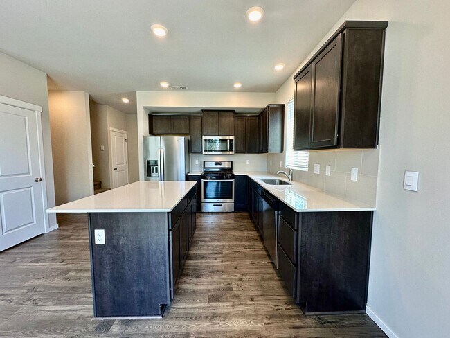 Building Photo - 4 Bedroom Home with Attached 2 Car Garage!