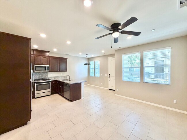 Building Photo - Move-In Ready 2 Bedroom 2.5 Bathroom Condo with LOFT & 2 Car Garage