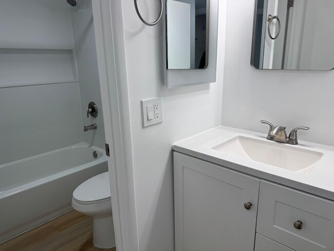 Building Photo - NOW OFFERING $400 OFF MOVE-IN COSTS Utilities Included – First Floor – In-Unit Washer/Dryer