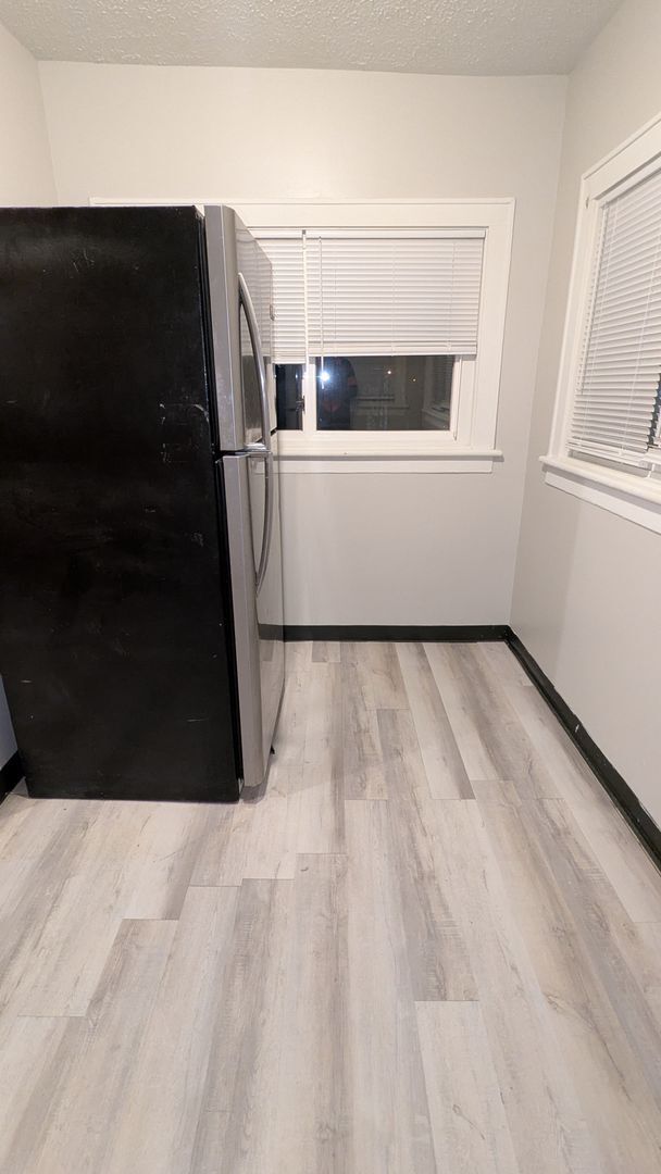 Building Photo - Charming 3-bedroom, 1-bathroom home located in the vibrant city of Akron