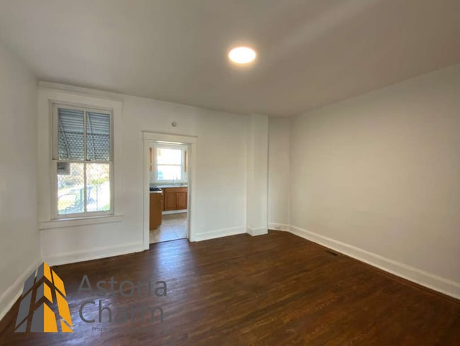 Building Photo - 2 Bed with Finished Basement, Deck off Bedroom, and Backyard