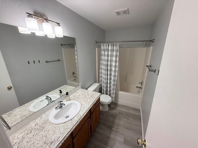 Building Photo - 4 Bedroom - 2 bath duplex located near campus and State Highway 9