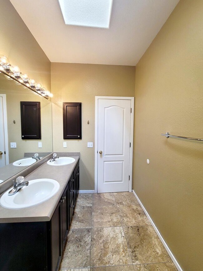 Building Photo - Boastful 3 Bedroom West Side home in gated...