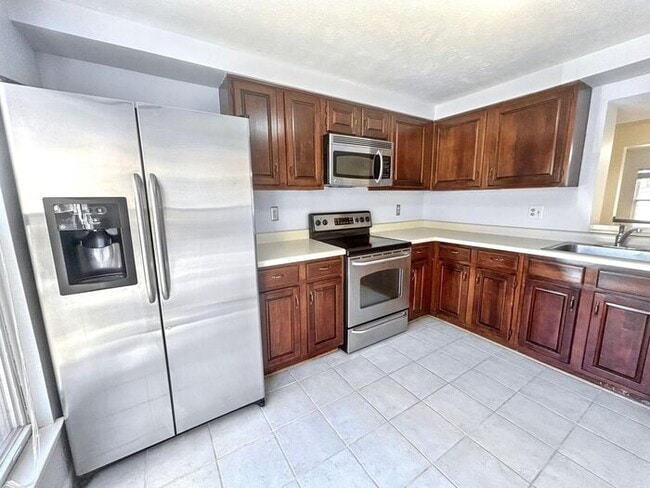Building Photo - Charming 2-Bedroom Home with Modern Amenit...