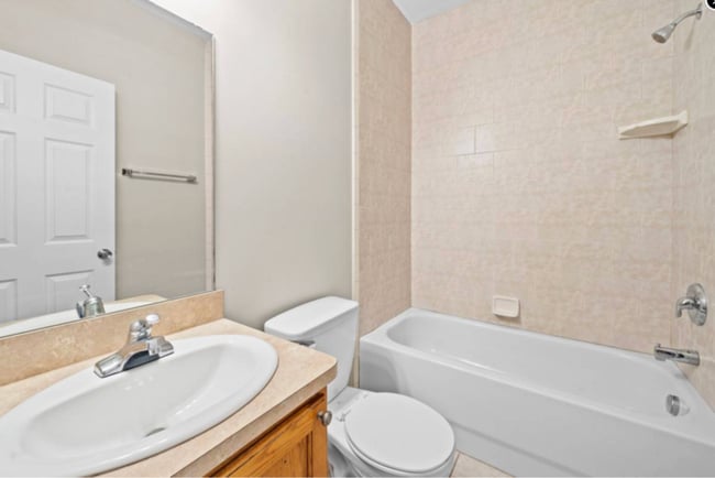 Building Photo - Towne Center Flats - 14064 Webster Dr.