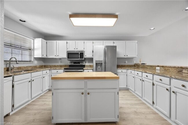 Building Photo - 6654 Tannin Ln