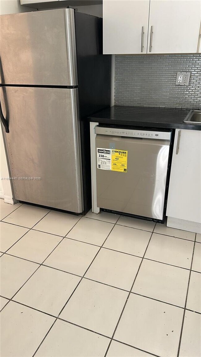 Building Photo - 8301 SW 142nd Ave